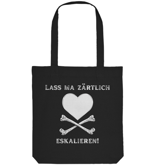 Die „Krawall + Zärtlichkeit“-Poetry-Slam-Baumwolltragetasche von Artbookings/Shirtigo zeigt ein weißes Herz mit gekreuzten Knochen und den Slogan „Lass ma zärtlich eskalieren!“ – perfekt für alle, die mutige, stilvolle Statements lieben.