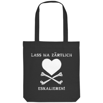 Der „Krawall + Zärtlichkeit Poetry Slam – Baumwolltragetasche – Lass ma zärtlich eskalieren“ von Artbookings/Shirtigo ist eine schwarze Baumwolltasche mit einem weißen Herz über gekreuzten Knochen und einem deutschen Text – perfekt für Poetry-Slam-Fans.