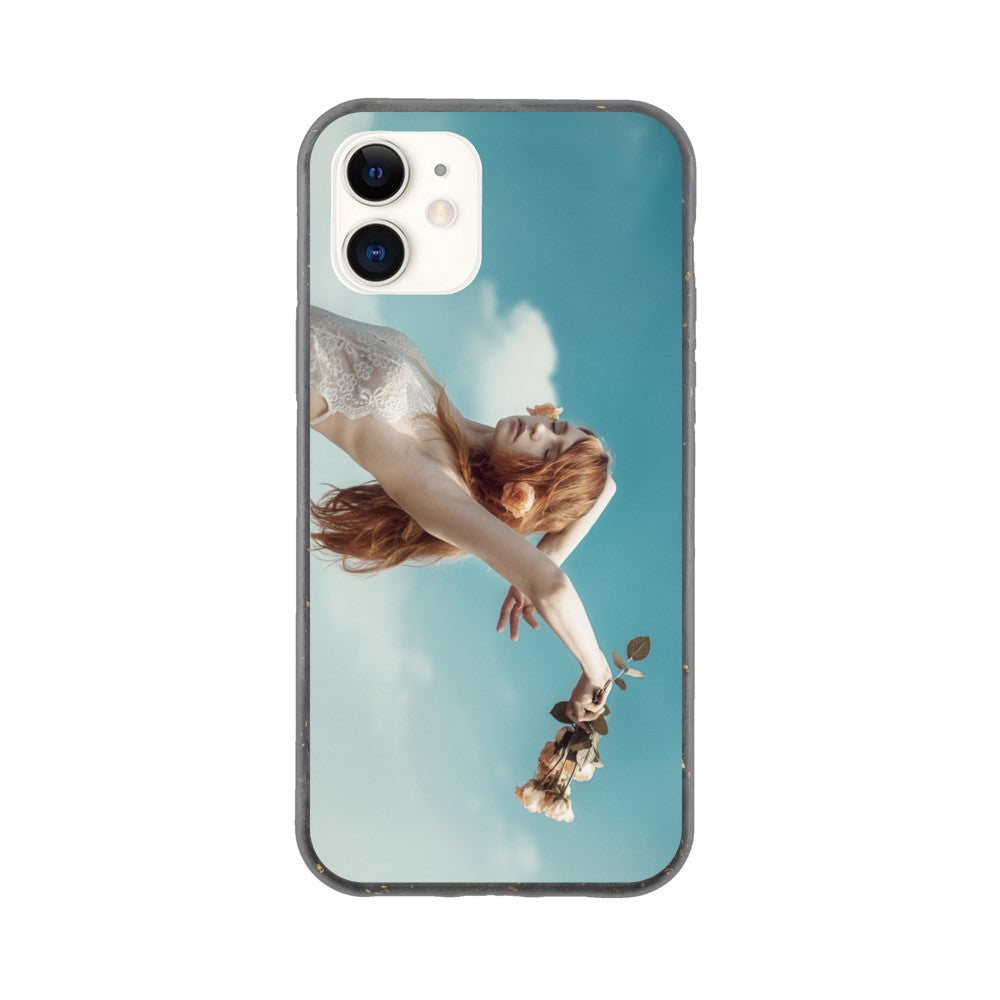 Eine iPhone-Handyhülle mit einem Kunstdruckbild eines in der Luft fliegenden Mädchens mit dem Titel „Roses & Freedom“ von Artbookings/Gelato.